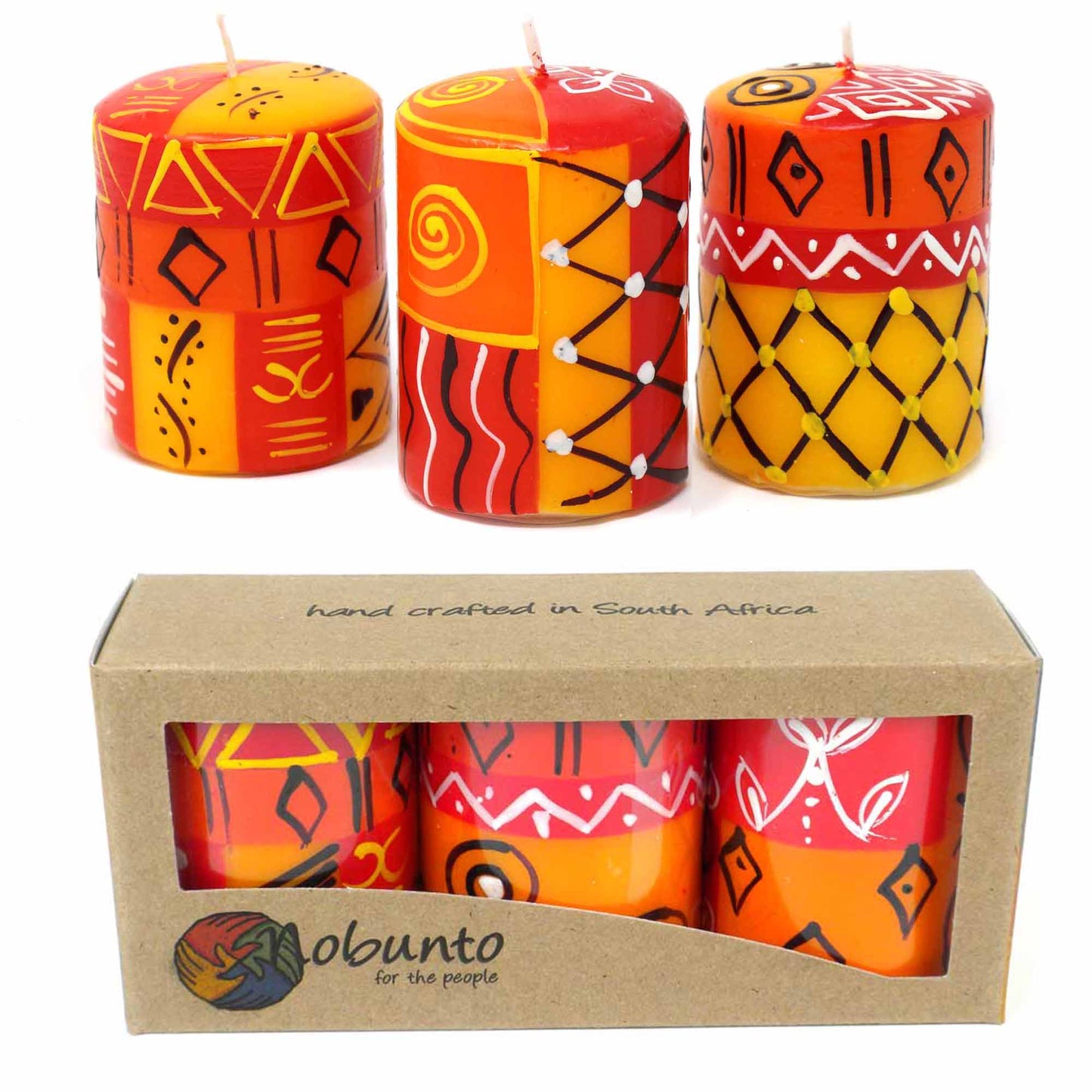 This set of three candles, hand-painted by South African artisans, arrives in a recycled cardboard gift box. Each candle is 2.5 inches tall by 1.75 inches in diameter.