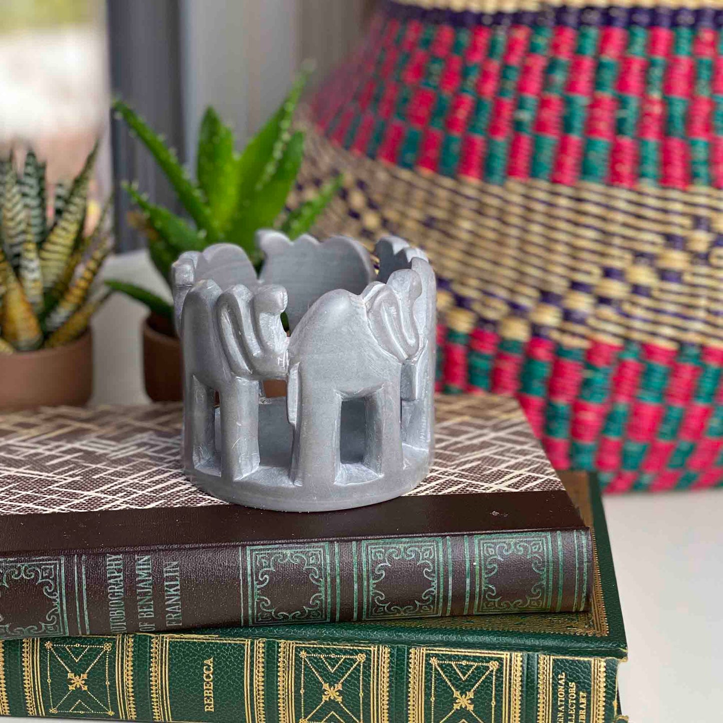 circle-of-elephants-soapstone-sculpture-3-to-3-5-inch-dark-stone