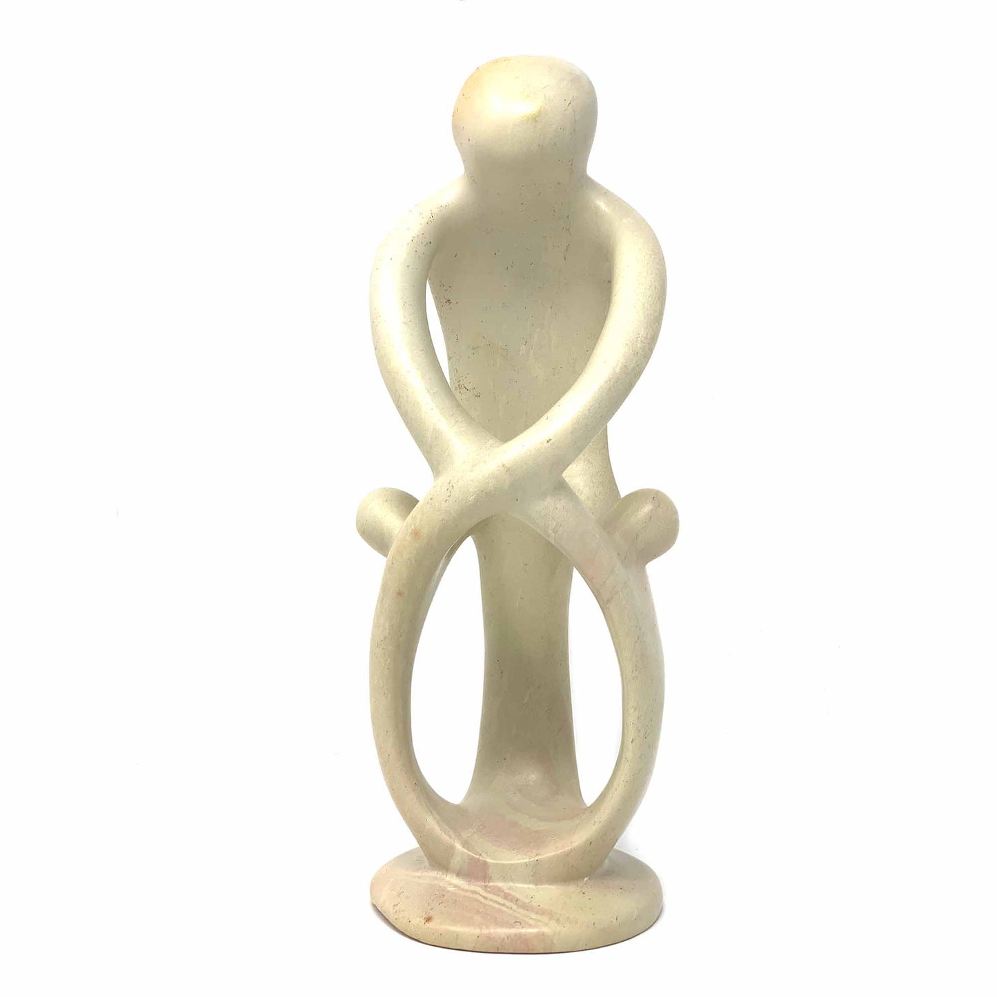 African Soapstone is among the most beautiful in the world. Mined by hand from surface mines large stones are pulled by a team of workers, cleaved into smaller pieces and worked into stunning art and functional objects. This sculpture depicts a stylized family. The soapstone is natural. Please allow for color variation from cream to pink to gray in any single piece. Dimensions: 8 inches tall by 4 inches wide and 3 inches in diameter.