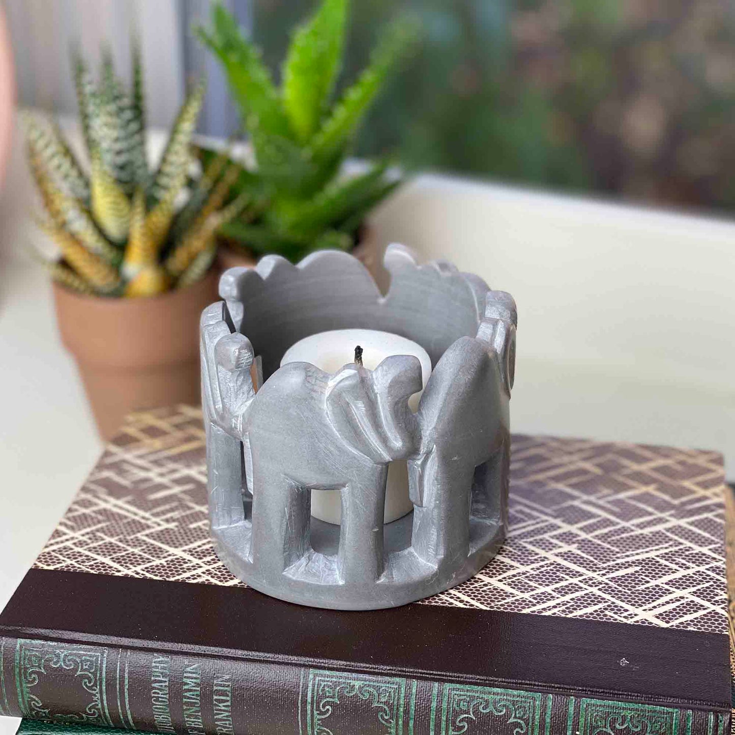 circle-of-elephants-soapstone-sculpture-3-to-3-5-inch-dark-stone