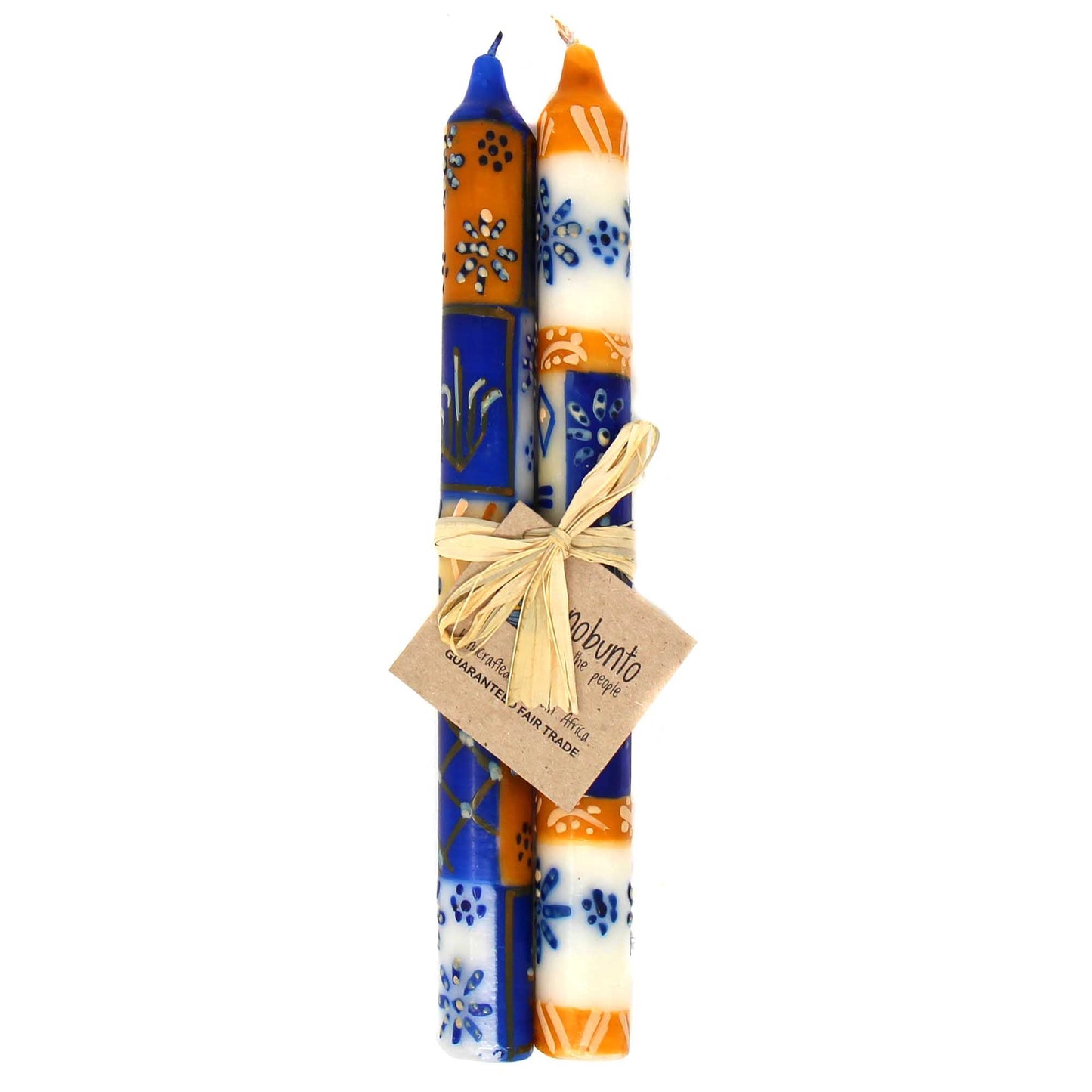 Hand painted in South Africa, this pair of candles is tied with raffia. Each candle is 9 inches tall by 0.75 inches in diameter.