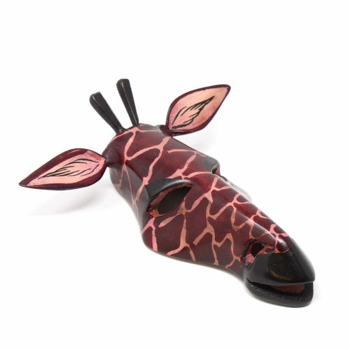 This Giraffe mask is hand-carved and hand-painted by economically disadvantaged members of the Kamba tribe in Kenya. Purchasing this product provides sustainable income for the artists to support their families and send their children to school. Mask measures approximately 8.5 inches in height and 4 inches in depth.