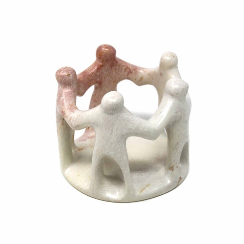 African Soapstone is among the most beautiful in the world. Mined by hand from surface mines large stones are pulled by a team of workers, cleaved into smaller pieces and worked into stunning art and functional objects. This sculpture depicts a stylized circle of friends. The soapstone is natural.  Please allow for color variation from cream to pink to gray in any single piece.  Dimensions: 3 inches tall by 3 inches wide and 3 inches in diameter.