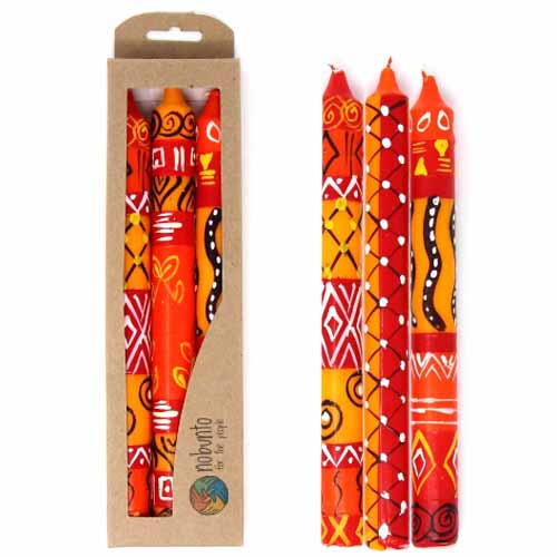 This set of three candles, hand-painted by South African artisans, arrives in a recycled cardboard box.  Each candle is 9 inches tall by 0.75 inches in diameter.