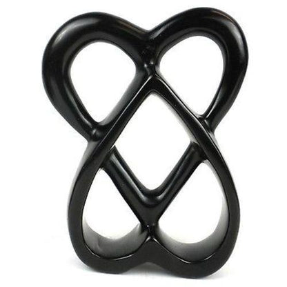 Handcarved from a single piece of soapstone, this sculpture features two intertwined hearts. It measures 8 inches tall.