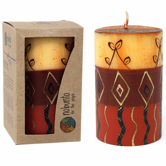 This pillar candle, hand-painted by South African artisans, arrives in a recycled cardboard gift box. The candle is 4 inches tall by 2 inches in diameter.