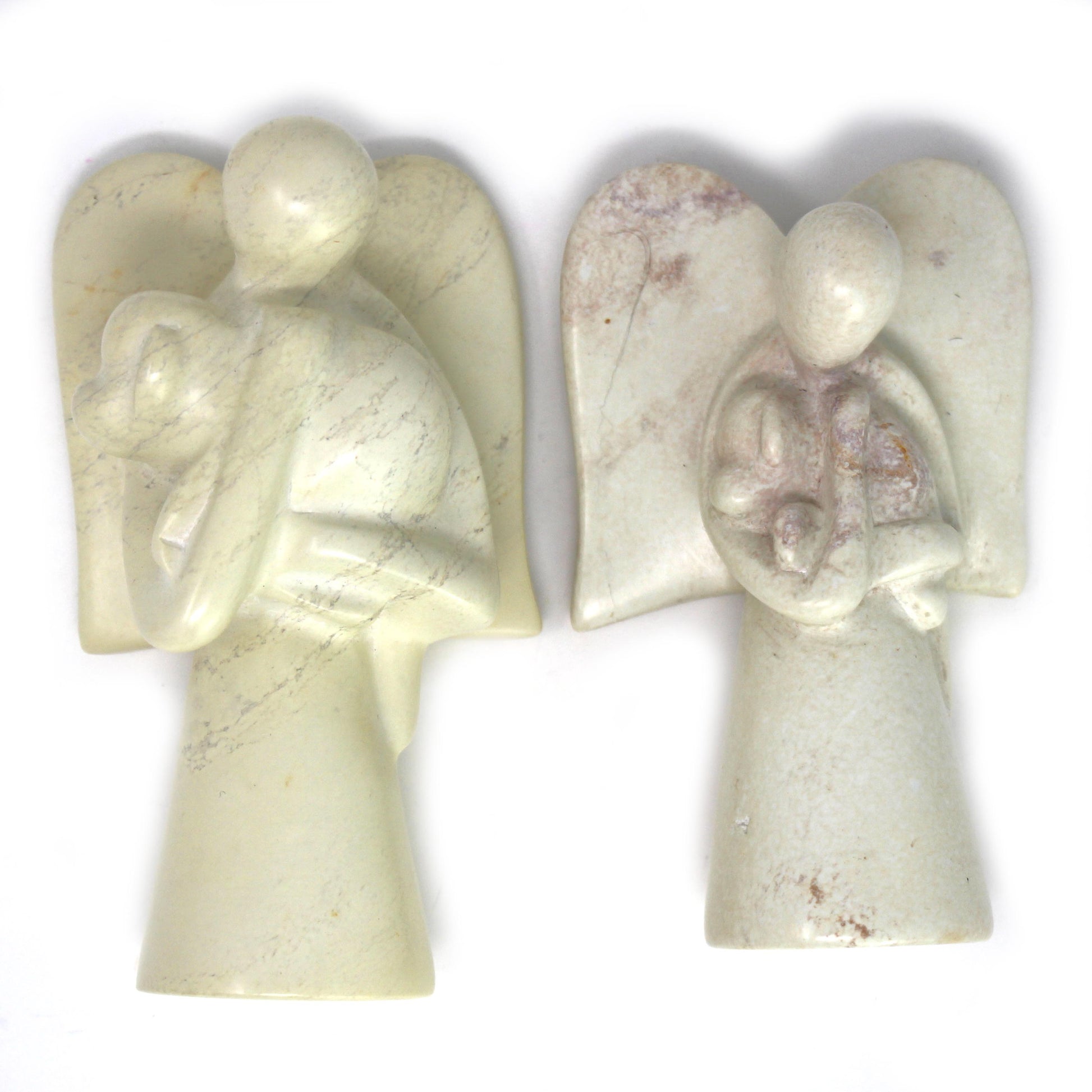 angel-soapstone-sculpture-holding-dog