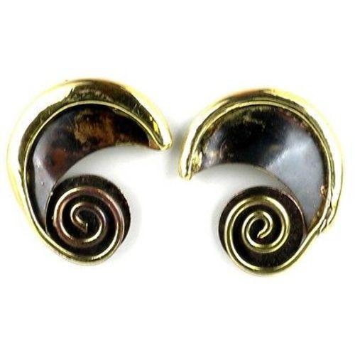 Handmade by South African artisans, a coil of brass emerges from a crescent of brass on these post earrings. The artisans apply high heat to achieve the antique coloration on the metal.Dimensions: 30 mm wide x 34 mm long.