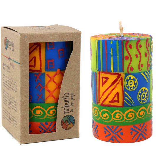 This pillar candle, hand-painted by South African artisans, arrives in a recycled cardboard gift box. The candle is 4 inches tall by 2 inches in diameter.