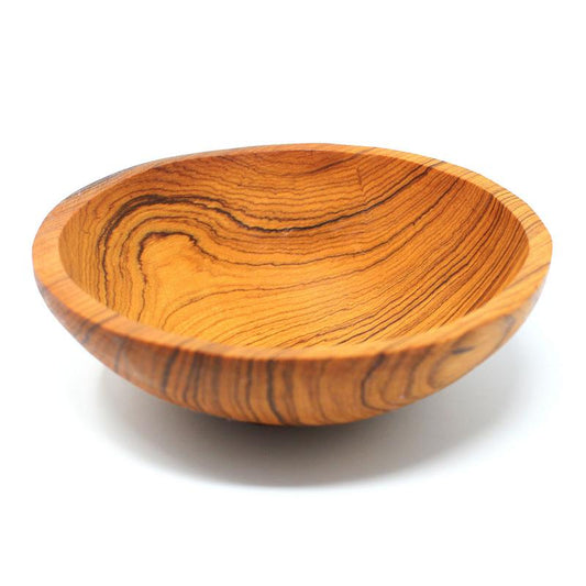 Highly grained hand carved olive wood bowl from Kenya, approximately  6 inches in diameter by 2 inches tall.  Please allow for variations due to the hand carved nature of the bowl.