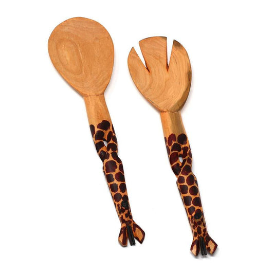 Handmade in Kenya, these salad servers are carved from one piece of wood. Each piece is hand painted and carved by hand. These salad tongs are a fun addition to any serving set - They are sure to attract complements. They are about 12 inches in length.