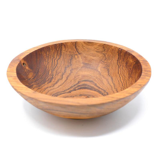 Highly grained olive wood bowl handcarved in Kenya using rudimentary hand tools, approximately 7.5 inches in diameter by 2.25 inches tall. Please allow for variations due to the handcarved nature of the bowl.