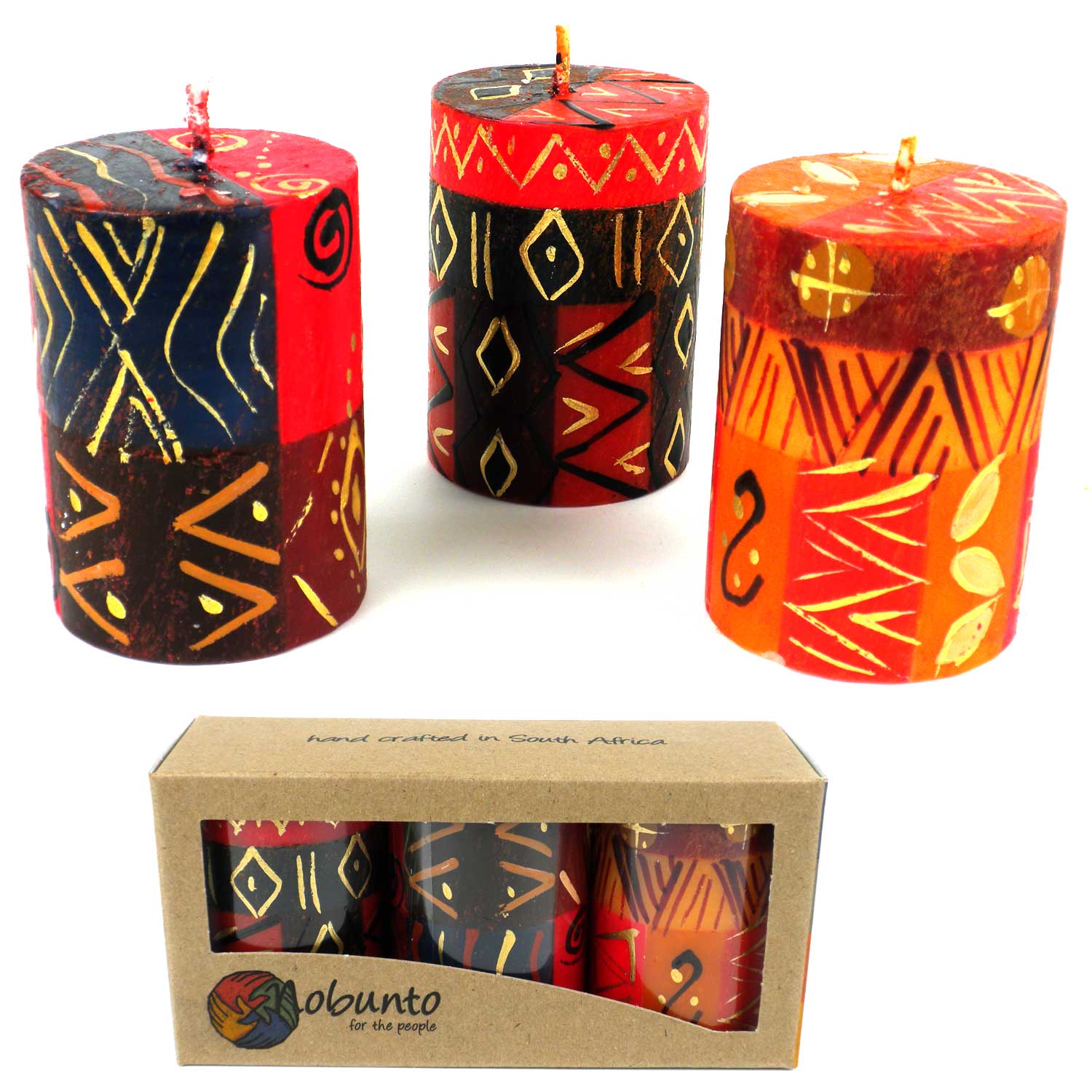 This set of three candles, hand-painted by South African artisans, arrives in a recycled cardboard gift box.  Each candle is 2.5 inches tall by 1.75 inches in diameter.