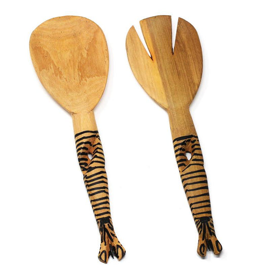 Handmade in Kenya, these salad servers are carved from one piece of wood. Each piece is hand painted and carved by hand. These salad tongs are a fun addition to any serving set - They are sure to attract complements. They are about 12 inches in length.