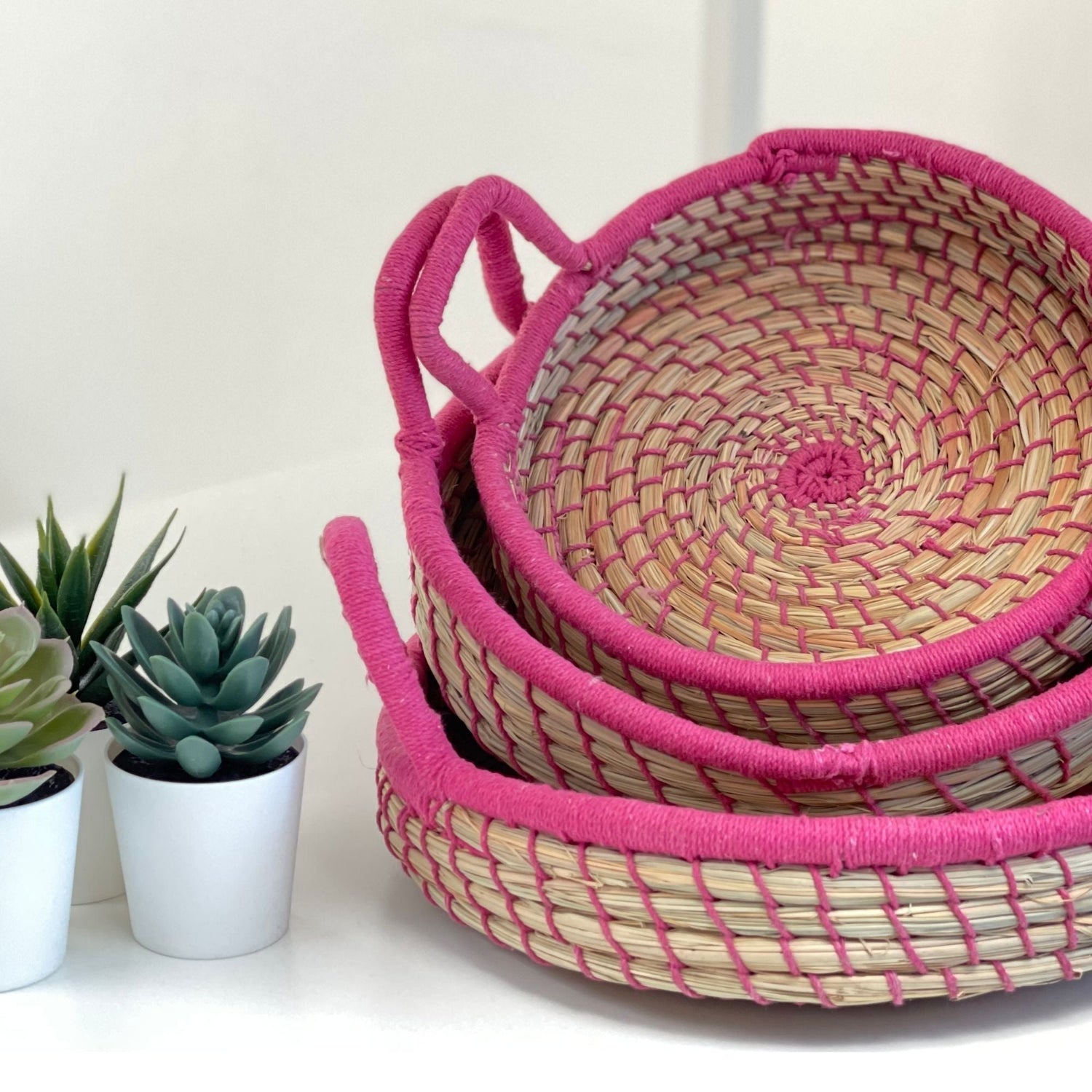 nested-baskets-in-natural-with-pink-accents-set-of-3